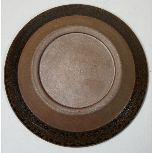 108 - Peter Dick (1936 - 2012), a small glazed dish, impressed mark to the base, diameter 15.5cm.