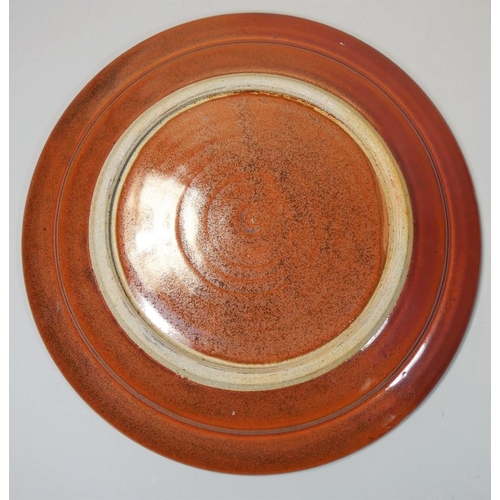 113 - Ray Finch (1914 - 2012), a large wood fired stoneware platter for Winchcombe Pottery, decorated with... 