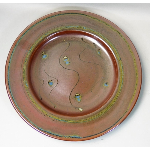 114 - Ray Finch (1914 - 2012), a large wood fired stoneware platter for Winchcombe Pottery, decorated with... 