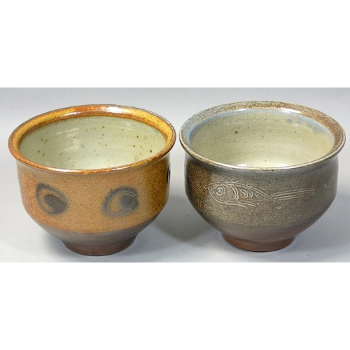 115 - Ray Finch (1914 - 2012), two salt glazed tea bowls, one with incised fish decoration and the other d... 