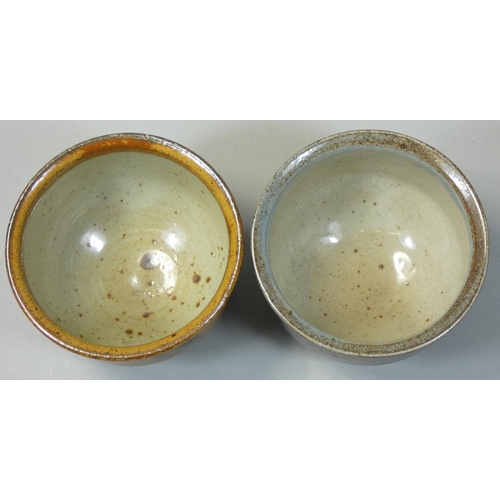 115 - Ray Finch (1914 - 2012), two salt glazed tea bowls, one with incised fish decoration and the other d... 