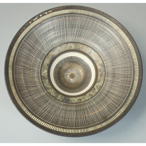 120 - Linda Forrest, (New Zealand, contemporary), a bronze glazed porcelain bowl, with sgraffito decoratio... 