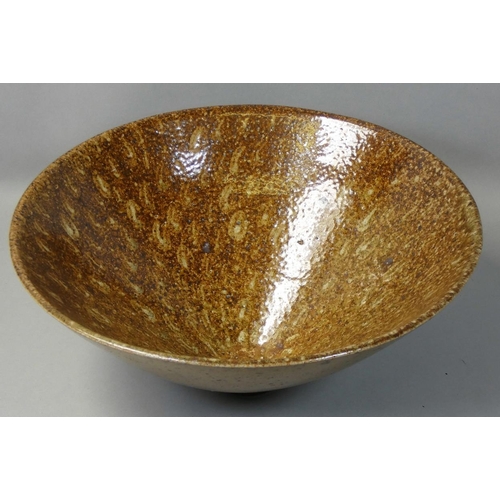 137 - Ruth King (b.1955), a large stoneware bowl on a conical foot, initalled base, diameter 27cm.