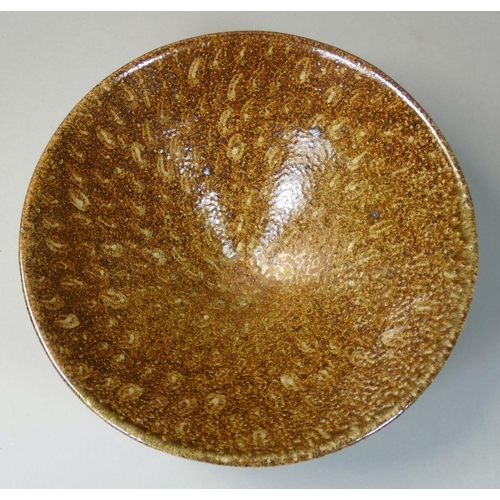 137 - Ruth King (b.1955), a large stoneware bowl on a conical foot, initalled base, diameter 27cm.