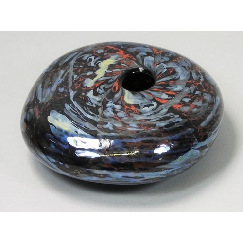 140 - Peter Layton (b.1937), a black and iridescent free blown pebble form, with etched makers name, dated... 