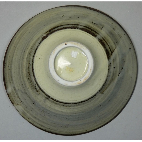 142 - David Leach OBE (1911 - 2005), a porcelain dish, rich tenmoku glaze with thick crawling white dolomi... 