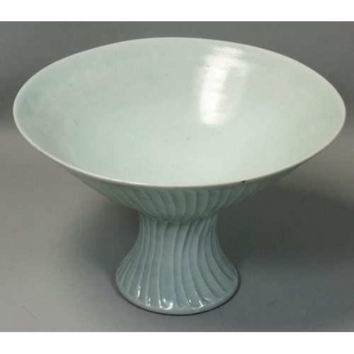 143 - David Leach OBE (1911 - 2005), a porcelain fluted pedestal bowl, pale green celadon glaze over delic... 