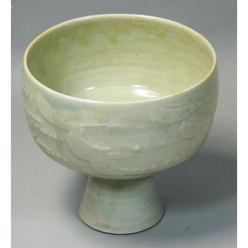 144 - David Leach OBE (1911 - 2005), a porcelain footed bowl, pale green celadon glaze, relief scroll deco... 