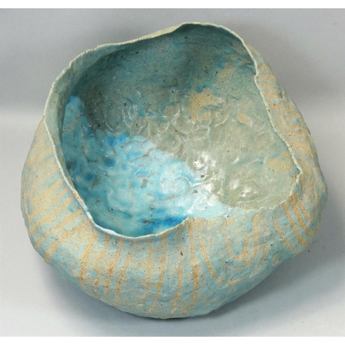 147 - Martin Lewis, a pale blue stoneware bowl of irregular form, no makers mark, diameter 23cm, height 18... 