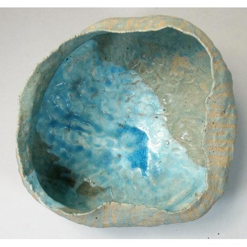 147 - Martin Lewis, a pale blue stoneware bowl of irregular form, no makers mark, diameter 23cm, height 18... 