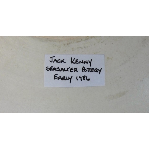 15 - Jack Kenny, a large deep stoneware bowl with wavy rim covered in matt white glaze, impressed S mark,... 