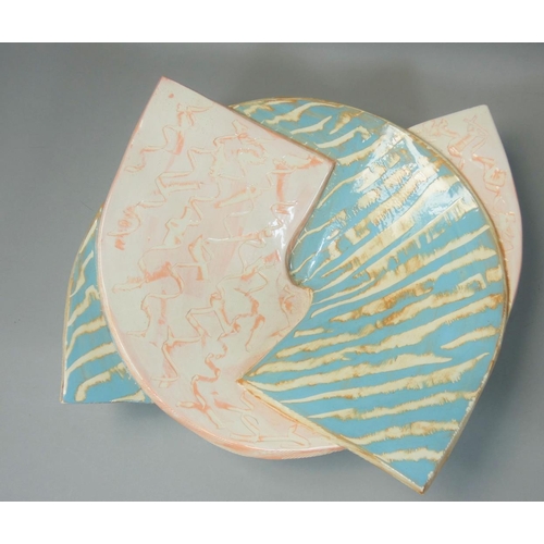 155 - Carol McNicoll (b.1943), an unusual split ceramic bowl, in the form of two interwoven arches, painte... 