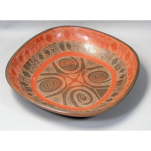 167 - Siddig El Nigoumi (1931 - 1996), an earthenware burnished clay square dish, mottled brown and terra-... 