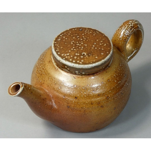 183 - Sarah Walton (b.1945), an ochre glazed stoneware teapot, with speckle pattern design, initialled 'SW... 