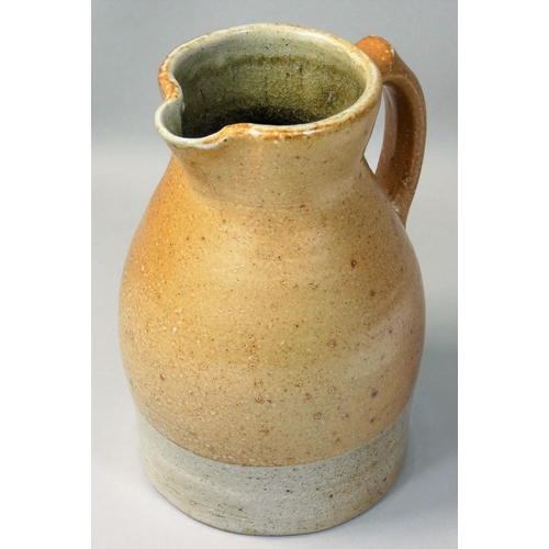 185 - Sarah Walton (b.1945), an ochre glazed stoneware jug, with speckle pattern design, initialled 'SW' t... 