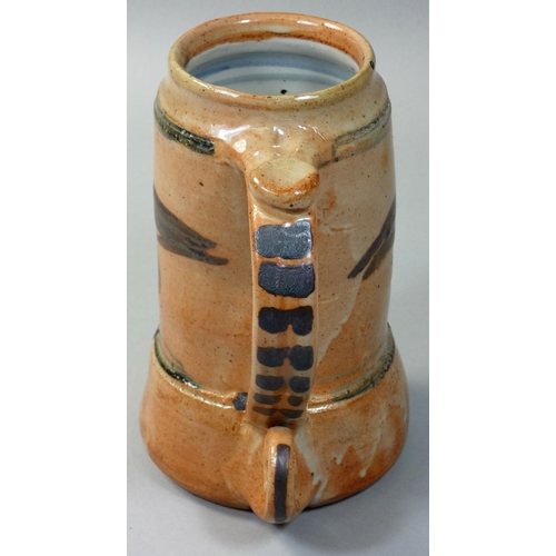 26 - Seth Cardew (1934 - 2016), a stoneware mug decorated with birds, with scroll handle, for Wenford Bri... 