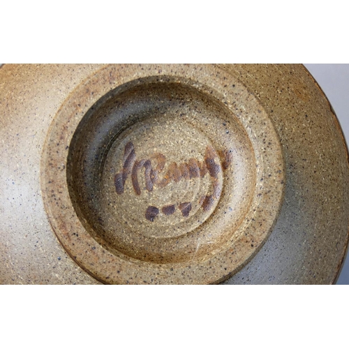 46 - Mick Arnup, a stoneware bowl with spiral design, signature to base, diameter 21cm.