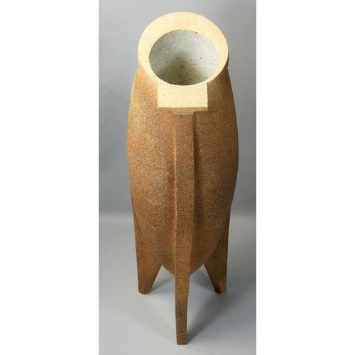 48 - Hannah Arnup, a stoneware textured oval vase on three legs, exhibition number 5, impressed makers ma... 