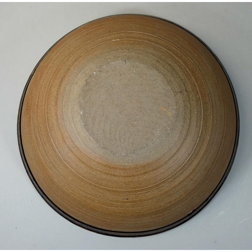 56 - Charles Bound (b.1939), a large stoneware dish with abstract pattern, diameter 38cm.