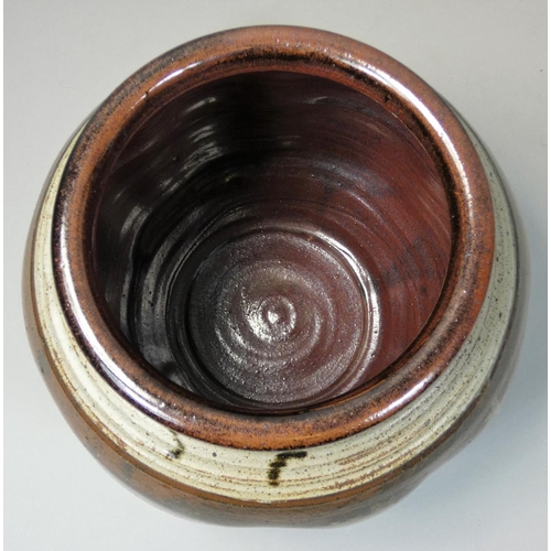 68 - Charles Bound (b.1939), a globular bowl with abstract decoration on a dark brown ground, ribbed rim,... 