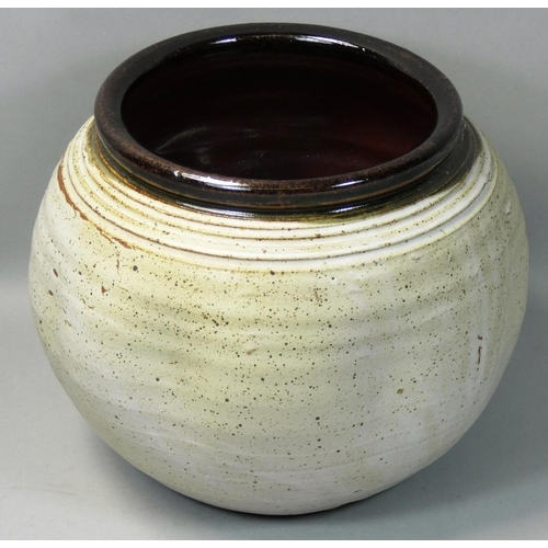 69 - Charles Bound (b.1939), a globular bowl with mottled glaze finish on a cream ground, ribbed rim, imp... 