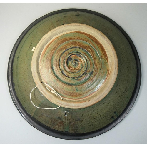 73 - Charles Bound (b.1939), a large stoneware abstract pattern dish, spiral pattern to the centre, diame... 