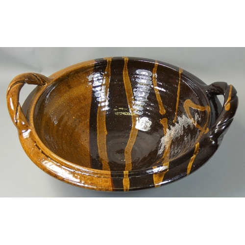 77 - Clive Bowen (b.1943), a large twin handled stoneware bowl, with rope twist style handles, handles 17... 