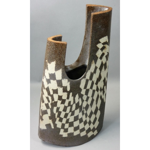 81 - Paul Brown (1921- 2000), a large stoneware abstract vase, with brown and white checkerboard decorati... 