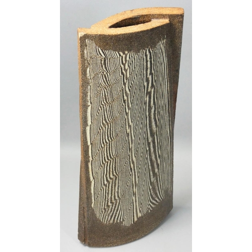 82 - Paul Brown (1921 - 2000), an unusual stoneware vase resembling tree bark, signed to the base, height... 