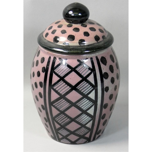 88 - Karen Bunting, a stoneware lidded container, in mottled salmon and grey glaze, engraved 'K Bunting',... 