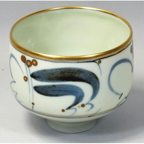 95 - Derek Clarkson (1928 - 2013), a porcelain chawan, of cylindrical form, painted with swirls of blue o... 