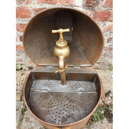 67 - A vintage Paraffin dispenser, with hinged cover.