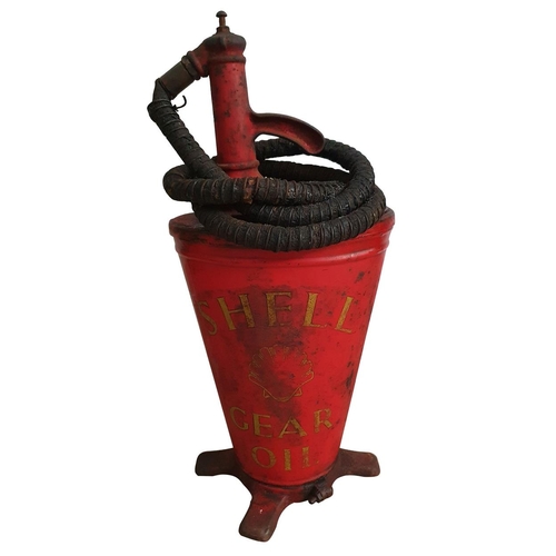 70 - A Shell gear oil pump, with original clam logo and pipe work, height 68 cm.