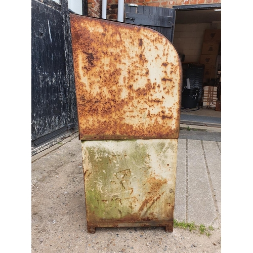 73 - A vintage oil dispenser cabinet, painted in white with Shell X 100 oil markings, the sliding door op... 