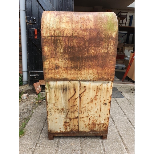 73 - A vintage oil dispenser cabinet, painted in white with Shell X 100 oil markings, the sliding door op... 