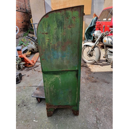 74 - A vintage oil dispenser cabinet, painted in Castrol colours, the sliding door opening to reveal thre... 