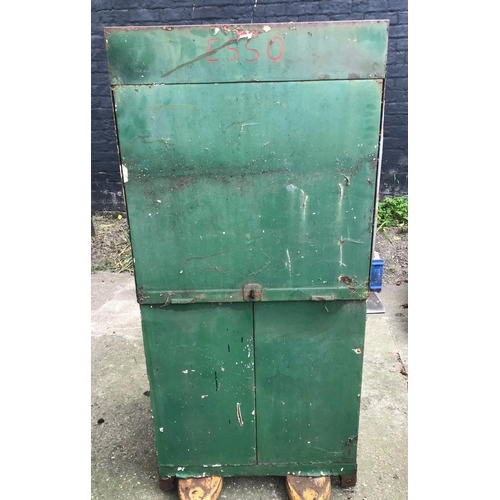 75 - A vintage oil dispenser cabinet, painted in Castrol colours, the sliding door opening to reveal two ... 