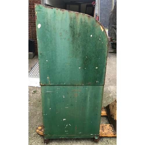 75 - A vintage oil dispenser cabinet, painted in Castrol colours, the sliding door opening to reveal two ... 