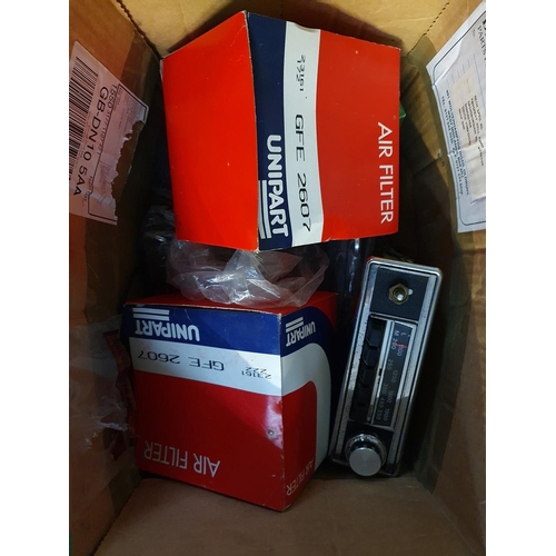 87 - A box of mainly MGB spares, together with a car radio.