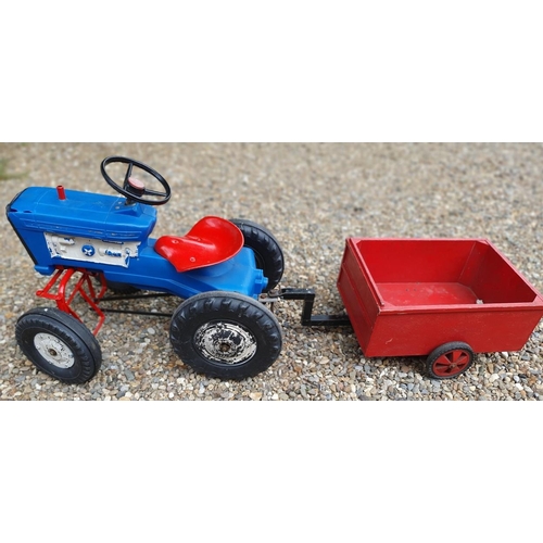 80 - Triang, a child's tractor, with home built trailer.