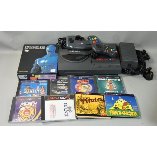 207 - An Amiga CD 32 (32-Bit) game console, ID No. 513515, complete with PSU, TV lead, Commodore mouse, Am... 