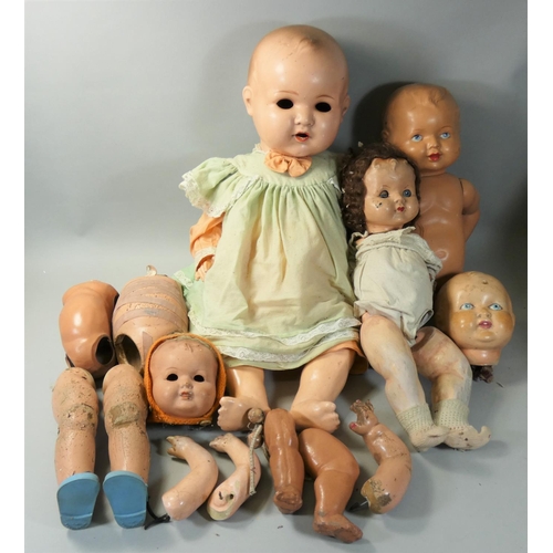 A group of five dolls to include an Armand Marseille doll marked AM Germany 518 8k height 61cm