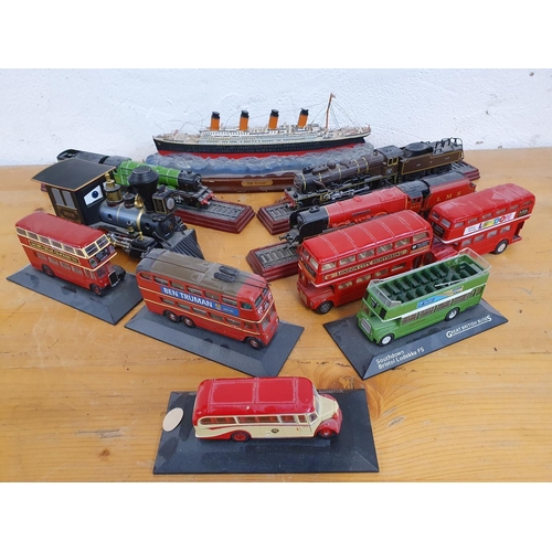 326 - A Danbury Mint Titanic, four model trains and six model buses (11)