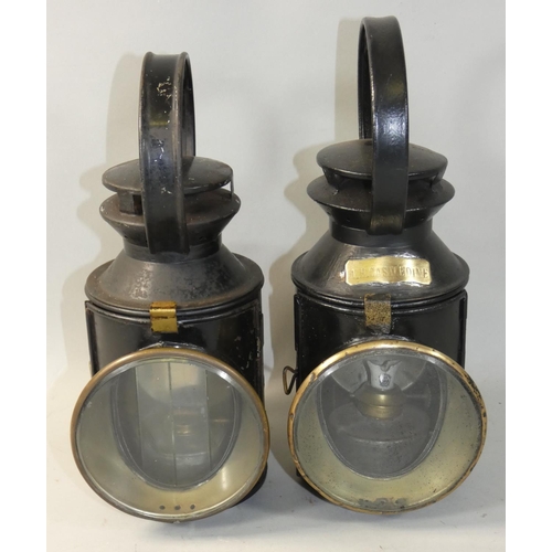 74 - A pair of railway signalling lamps, one by A. H. Castledine, the other L.M.S. 45393 (2).