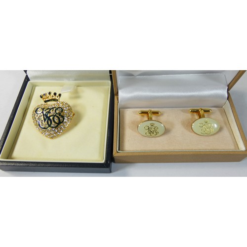 76 - A Venice Simplon-Orient-Express heart shaped brooch, case, together with a pair of cufflinks and a B... 