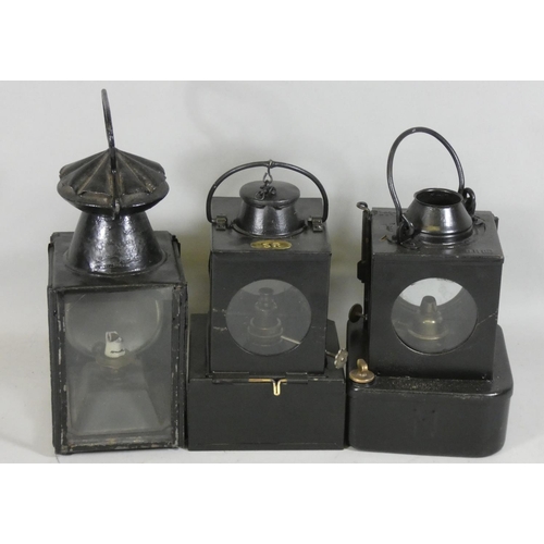 78 - A trio of railway related signalling lamps, to include one by Southern Railway, another by British R... 