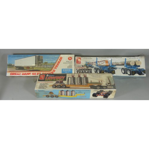 11 - Eleven boxed model construction kits, to include AMT; California Hauler Peterbilt 359, Autocar A64B ... 