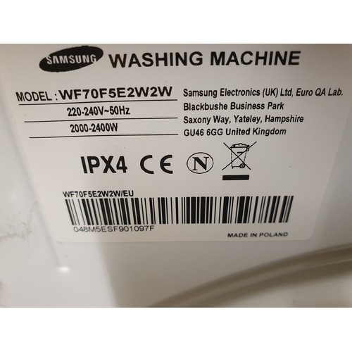 15 - A Samsung Ecobubble 7kg washing machine, model WF70F5E2W2W.