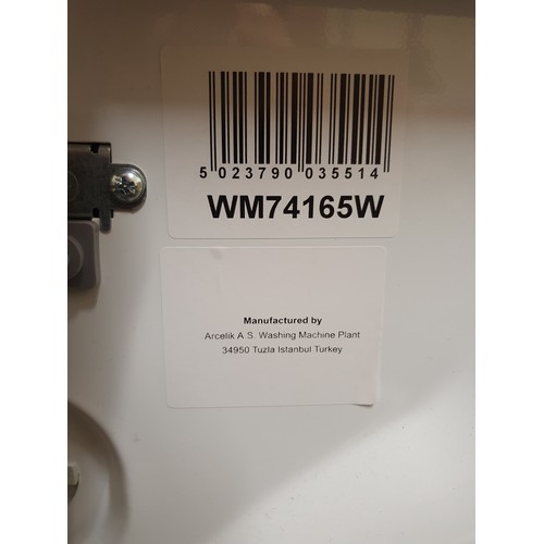 16 - A Beko 7kg washing machine, model WM74165W.