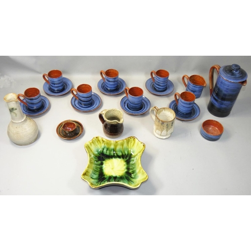 67 - A collection of Wold handthrown commemorative pottery, to include six coffee cups and saucers, milk ... 